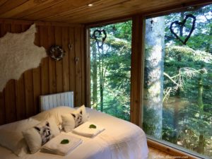 Espace Chambre de la Cabane Vision (N07) au Nids des Vosges à Champdray